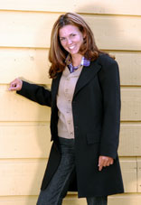 woman wearing frock coat and notch lapel vest